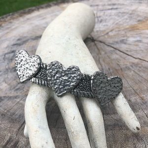 Silver metal barrette.
